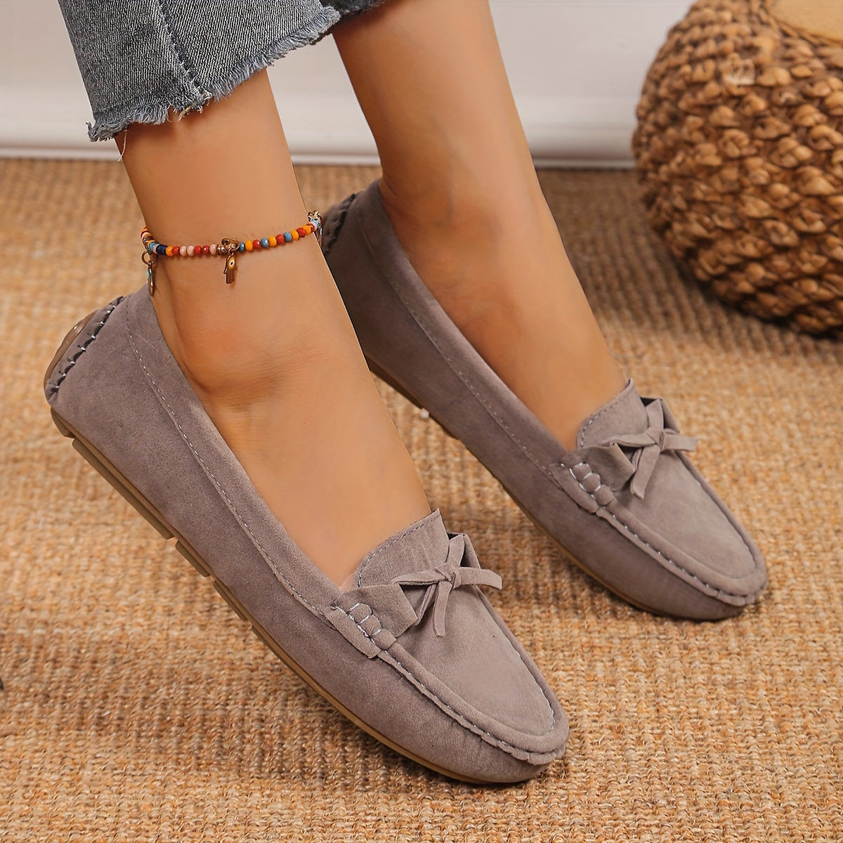 Retro flat loafers with bow detail, slip on style, and soft sole for casual wear.