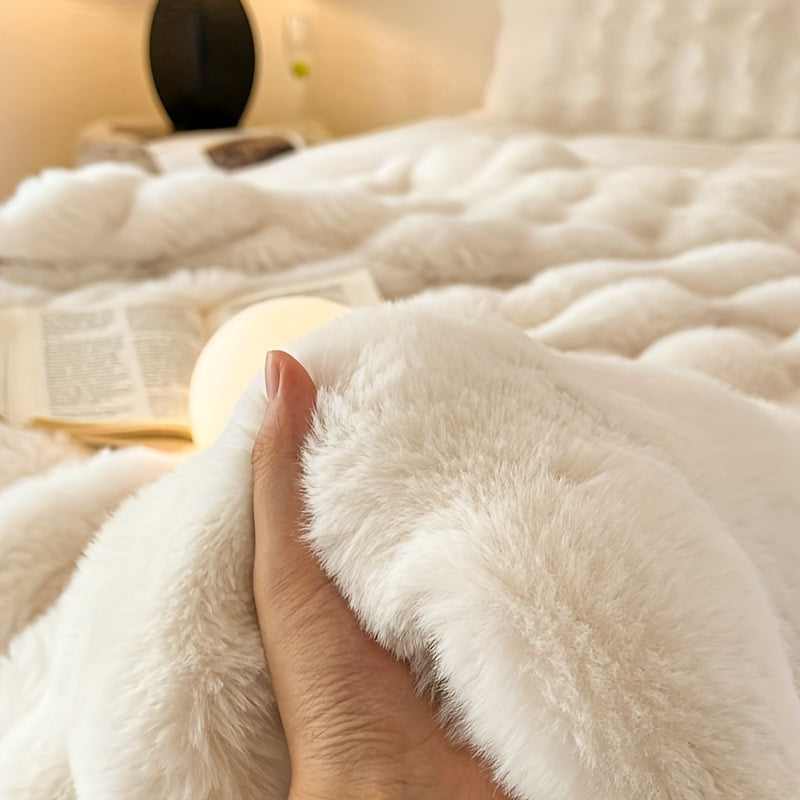 This high quality faux rabbit fur blanket is super soft, comfortable, and warm. It is perfect for all seasons and is ideal for use in the bedroom, office, camping, travel, or as home decoration.