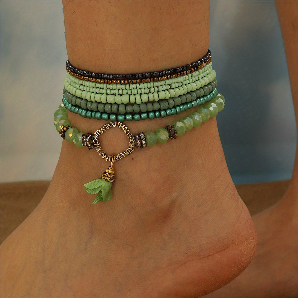 Set of 8 green rice beads beaded anklets for women, perfect for everyday wear and can be worn stacked as ankle bracelets.