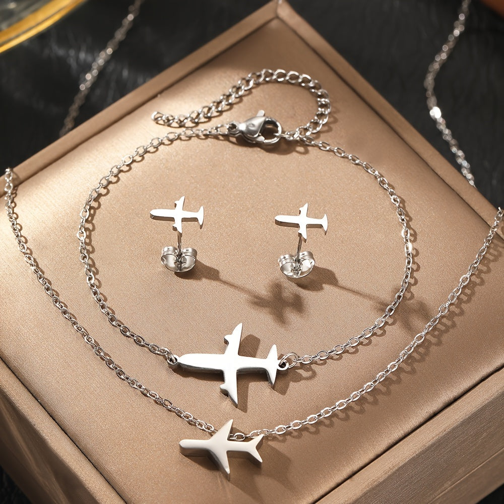 Stylish and elegant 4-piece jewelry set for women featuring stainless steel airplane pendant, chain bracelet, necklace, and earrings. Perfect for adding a touch of charm to any outfit. Makes a great birthday gift for her.