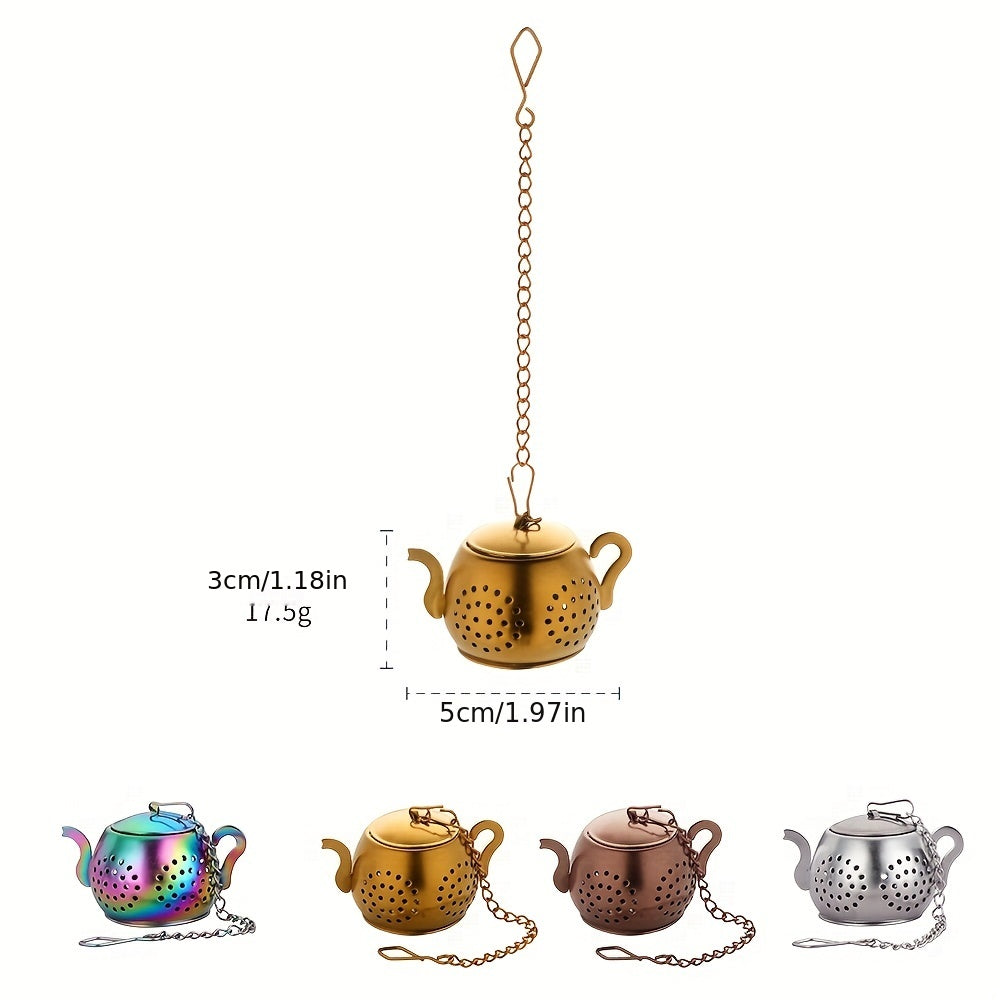 Golden rose stainless steel teapot-shaped tea strainer with uniform filter holes and hanging chain for cups.