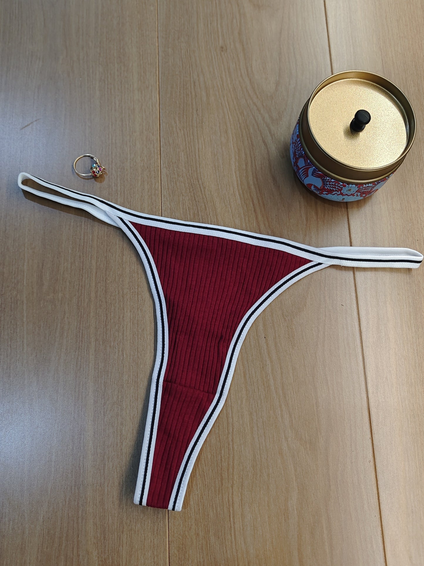 Women's low waist thongs with colorblock stripe print, perfect for sexy lingerie.