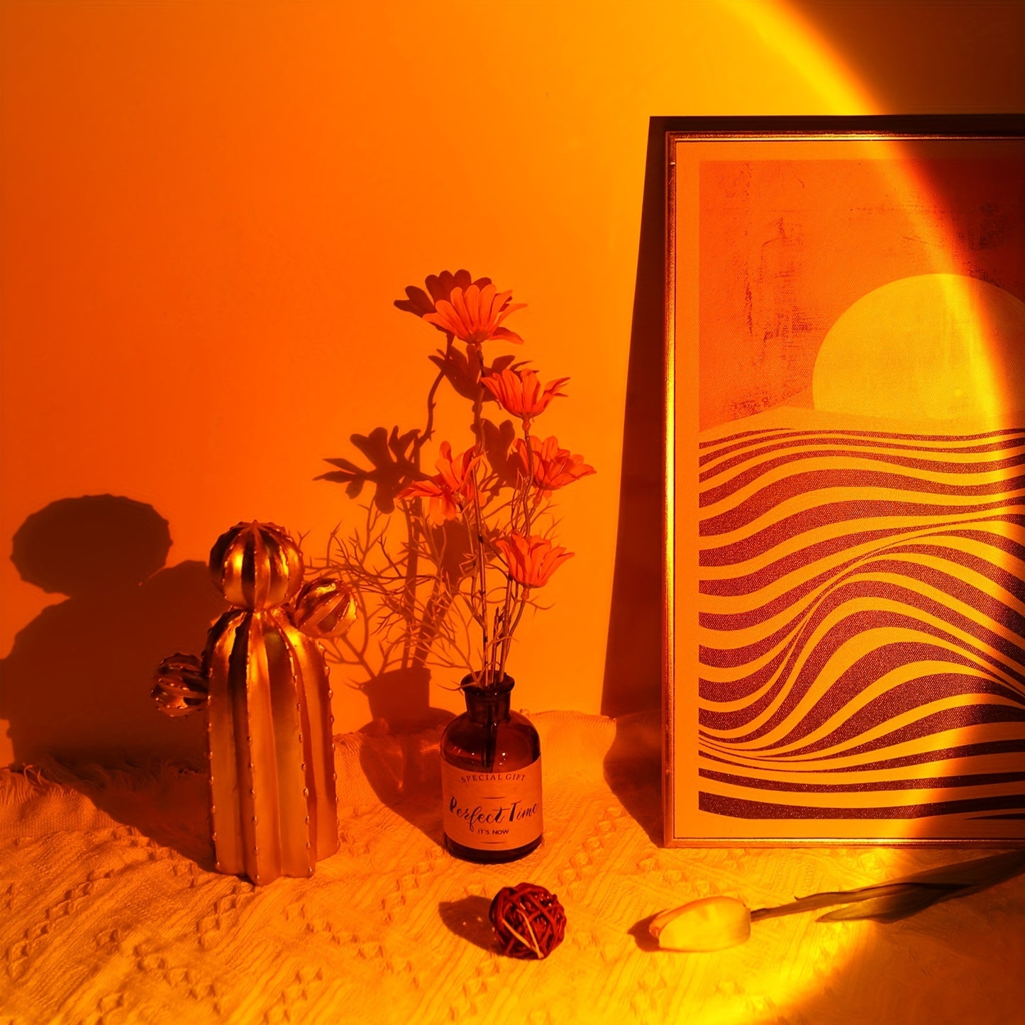 USB-powered LED sunset lamp projector creates warm orange ambiance for bedroom and living room decor. Suitable for photography. Energy-efficient tabletop design.