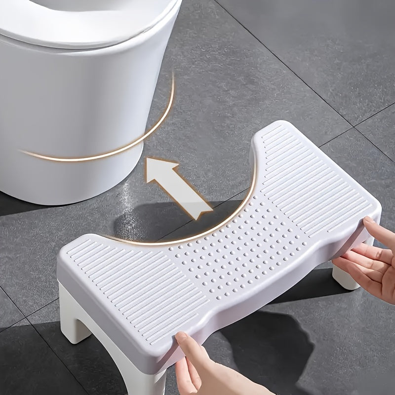 1pc Ergonomic Folding Toilet Step Stool with Durable Plastic Construction and Space-Saving Design, featuring Anti-Slip Feet and a 35-Degree Comfort Angle for Essential Bathroom Aid.