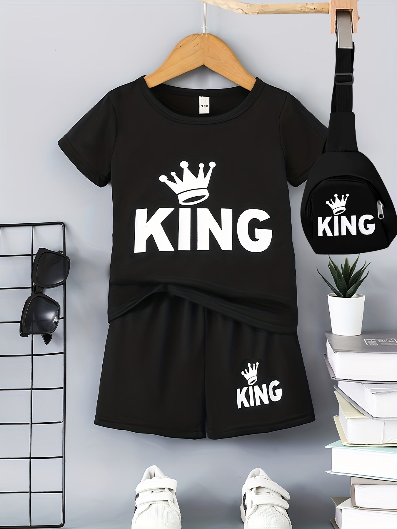 Boys' "KING" Crown Print Casual Outfit Set in Black - includes T-shirt, shorts, and crossbody bag. Made of 100% polyester, machine washable. Ideal for spring/summer, outdoor activities.