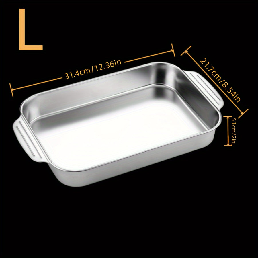 One piece of stainless steel deep baking sheet for non-stick cooking, grilling, and baking in the oven, with a selection of kitchen gadgets and accessories.