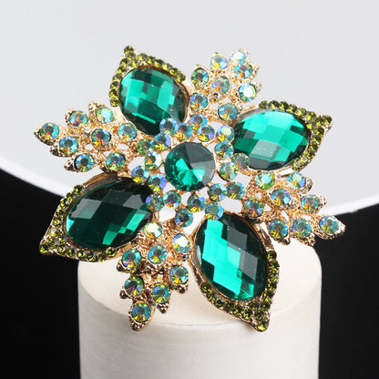 Luxurious Fashion Accessory: Vintage Green Rhinestone Flower Brooch with Baroque Elegance, Quadrangular Cross Design, and Irregular Shape