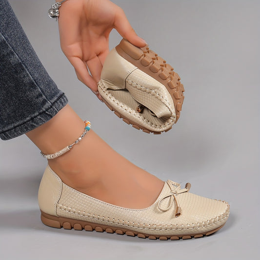 Women's bow flat shoes with solid color and soft soles, ideal for casual and comfortable everyday wear. Stylish and lightweight.