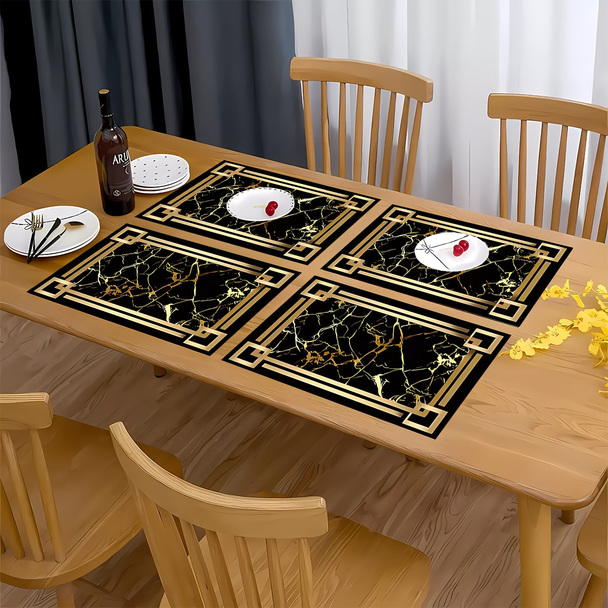 4 black and gold patterned table mats, ideal for kitchen or dining table décor and as a gift.