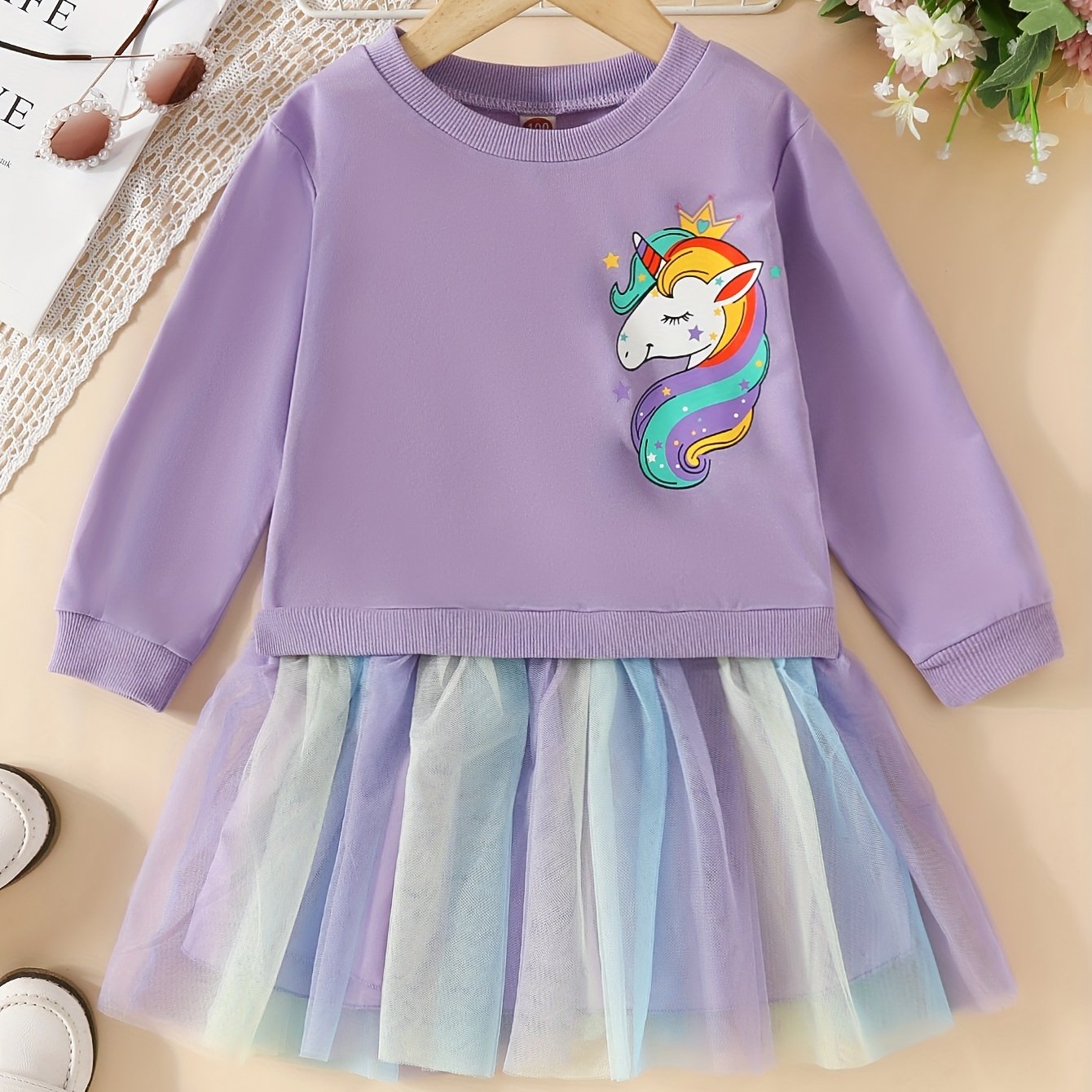 Rainbow tutu dress with unicorn print for girls, perfect for parties or vacations in spring or autumn.