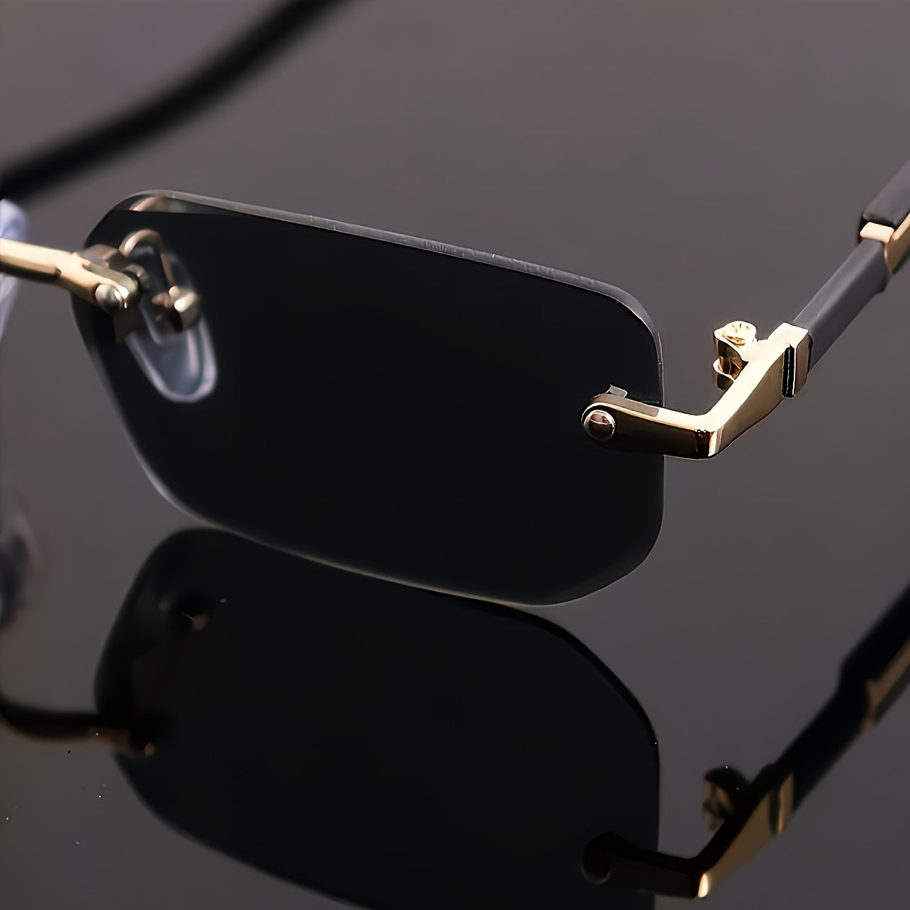 One pair of men's square rimless glasses in black with mirrored PC lens and metal frame for casual hip hop fashion.