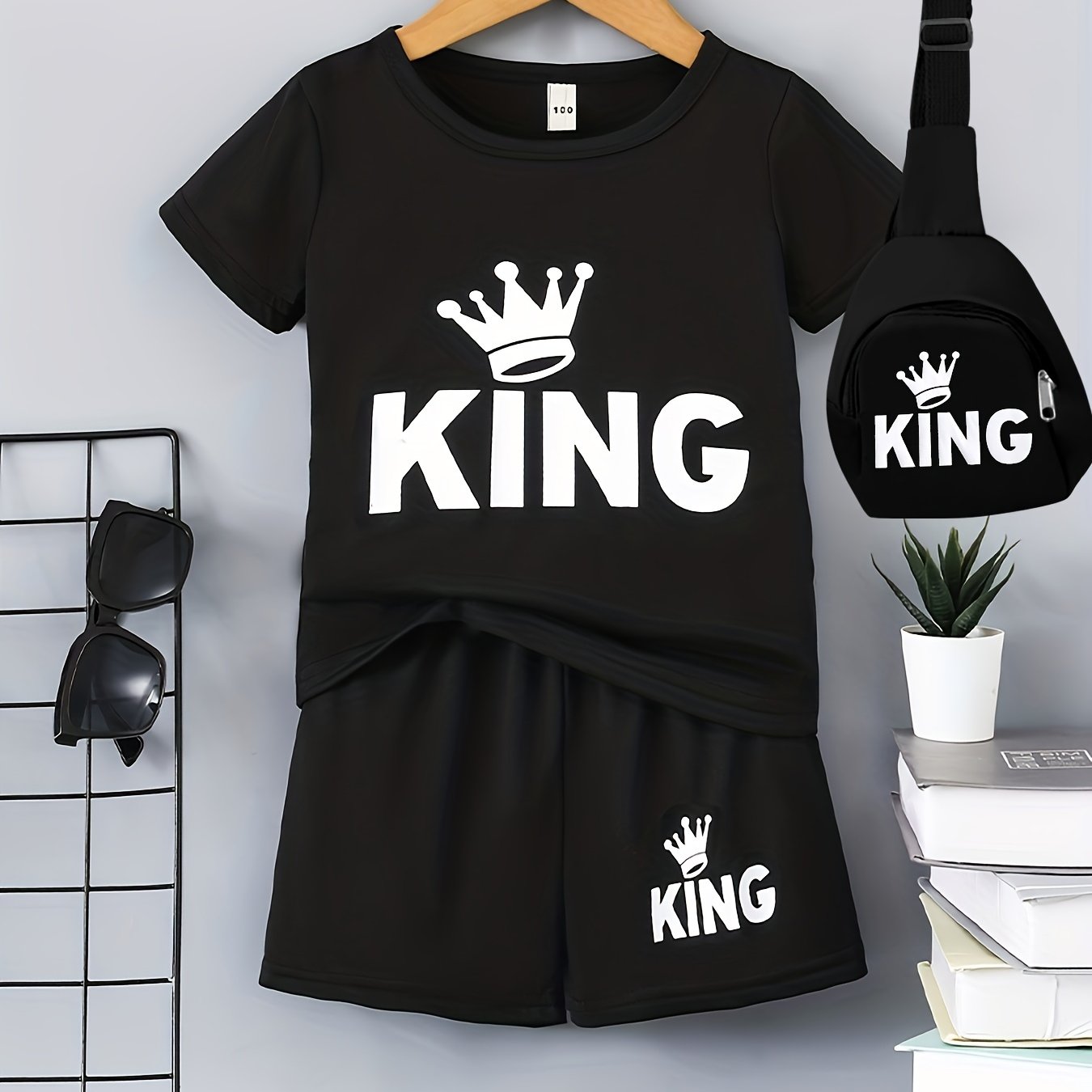 Boys' "KING" Crown Print Casual Outfit Set in Black - includes T-shirt, shorts, and crossbody bag. Made of 100% polyester, machine washable. Ideal for spring/summer, outdoor activities.