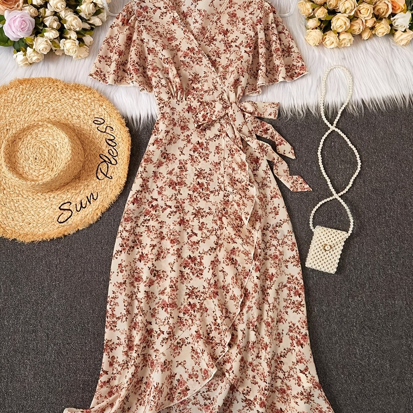 Women's elegant floral dress with bohemian ruffle sleeves, criss cross neckline, and lace-up detail. Made with woven polyester fabric, regular fit, includes belt. Suitable for all seasons.