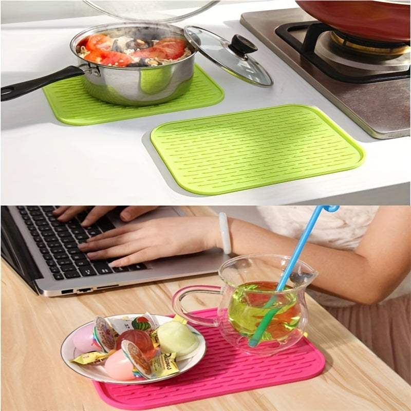 High-quality silicone drying mat for dishes, heat-resistant and non-slip, protects kitchen surfaces, versatile trivet, 21.59cm x 16.0cm, come in vibrant colors.