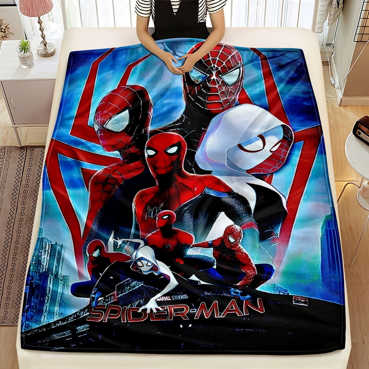 Four Spider-Man-themed decorative blankets that can be used as carpets, bed covers, towels, nap blankets, leisure blankets, and travel blankets. Made from knitted polyester, these blankets are modern and versatile, suitable for use in all seasons.