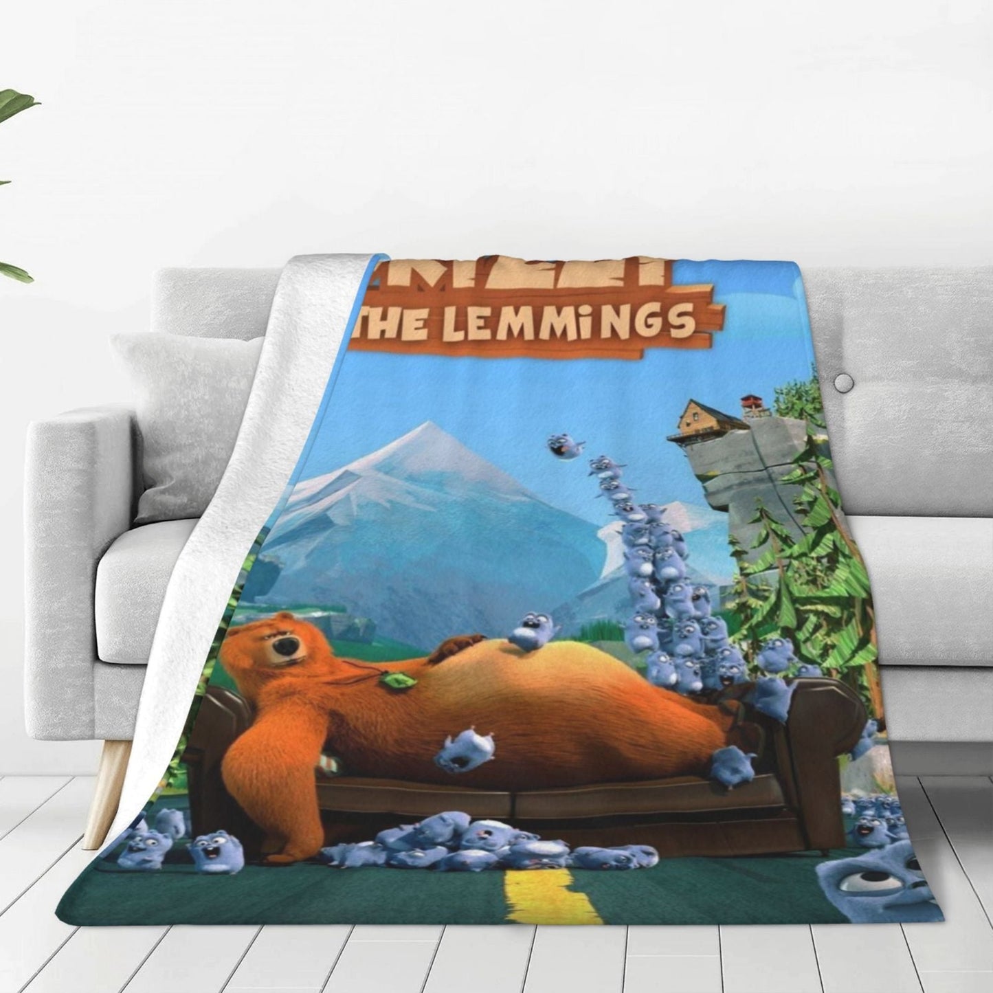 Soft polyester Grizzly & The Lemmings printed flannel throw blanket features a contemporary style with digital print and knitted craftsmanship. It showcases a charming design that is versatile for use on the sofa, bed, office, travel, and camping. This