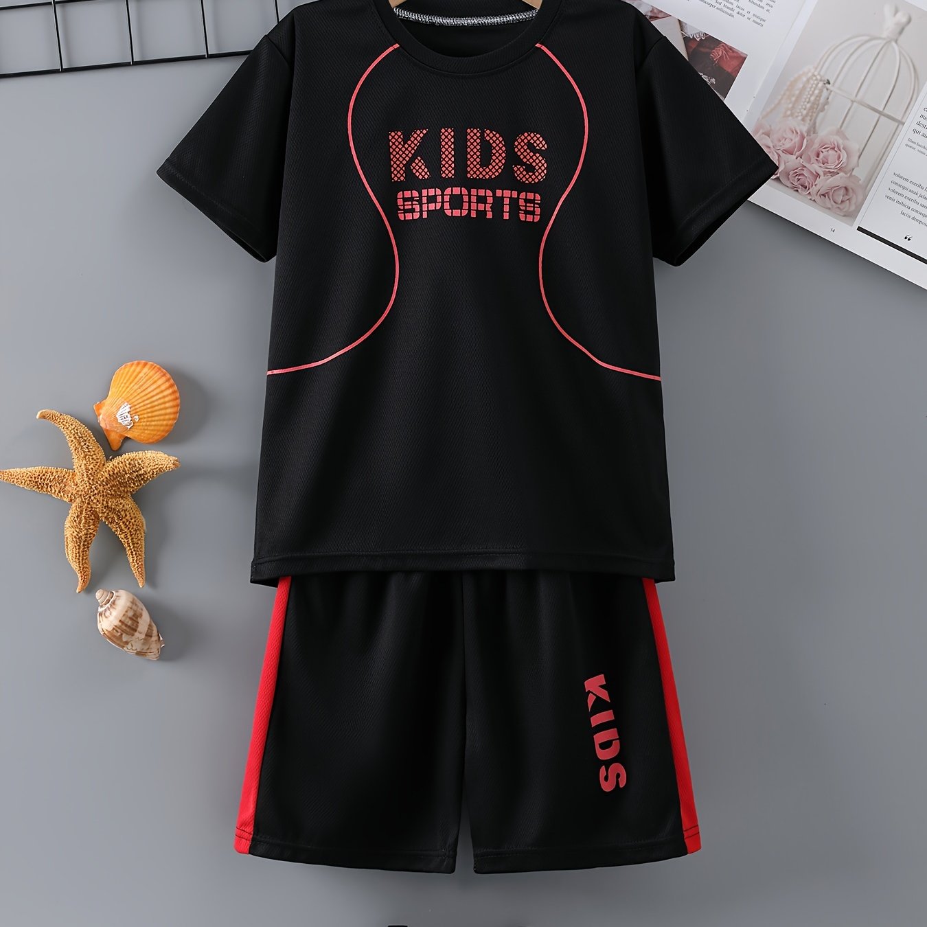 Children's quick-drying sports suit with short-sleeved shorts and KIDS SPORTS printed t-shirt, made with lightweight and comfortable quick-drying fabric.