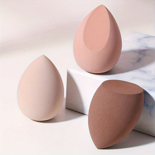 Set of 3 makeup sponges for dry and wet use, expanding egg-shaped cosmetic sponges for foundation and concealer application.