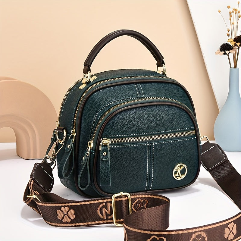 Versatile small handbag with multiple pockets and adjustable strap for women's fashion.