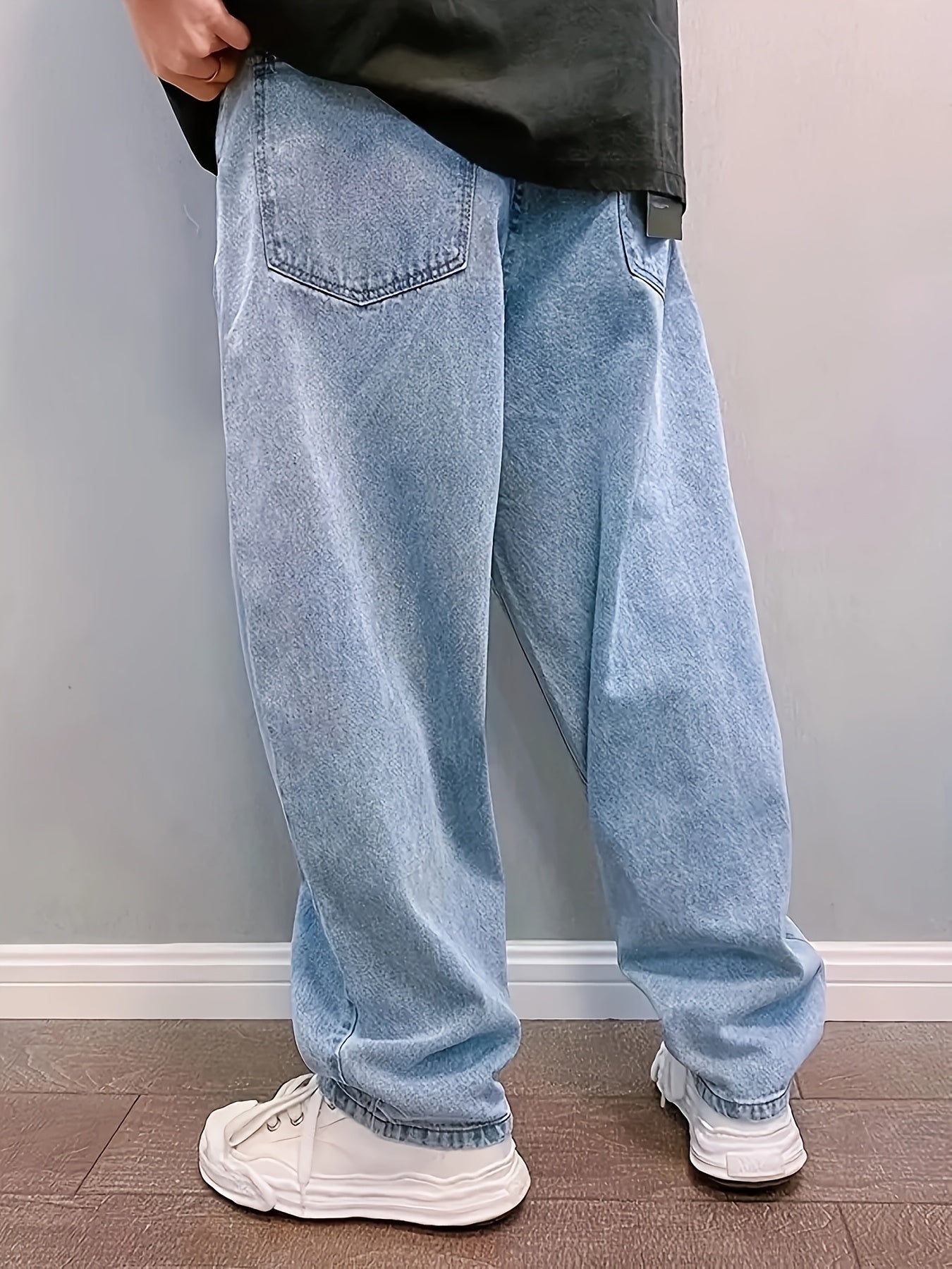 Men's wide leg jeans in a loose, non-stretch cotton blend with a solid color, mid waist, zipper fly, washed finish. Perfect for all-season casual wear with a street style vibe.