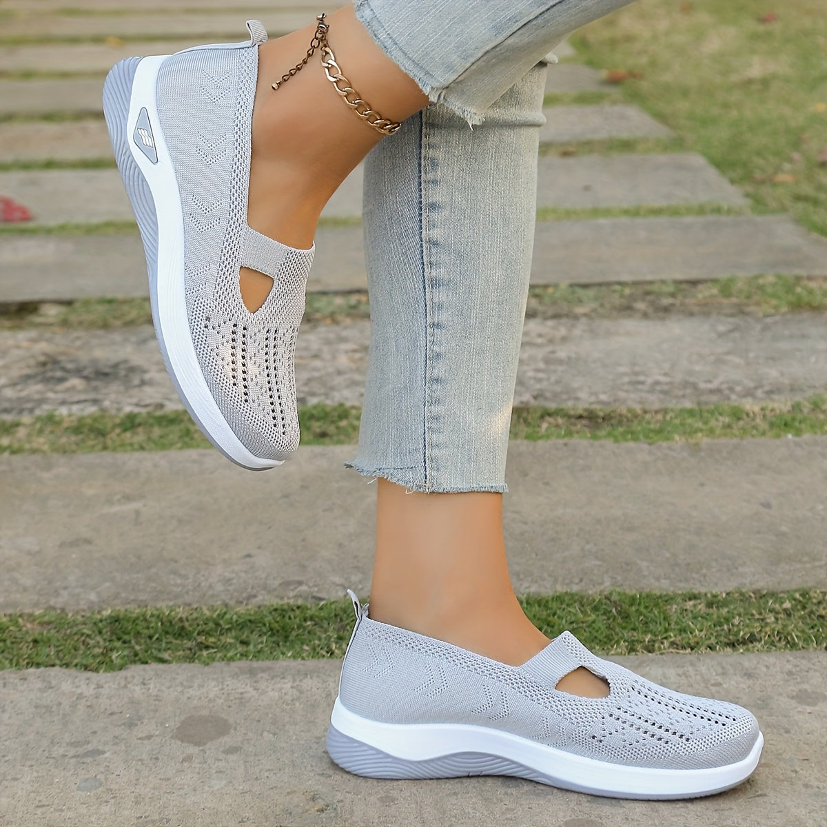 Women's lightweight slip-on running sneakers with breathable fabric and rubber sole for year-round comfort.