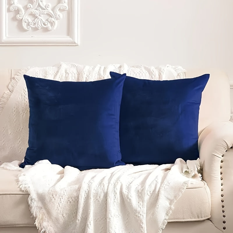 Two golden velvet throw pillow covers, 18x18, for couch or bed.