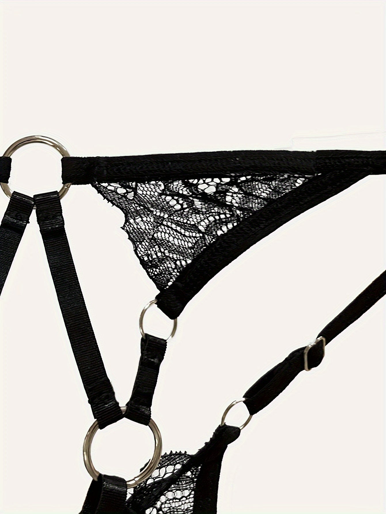 Lace thong with metal ring and see-through design