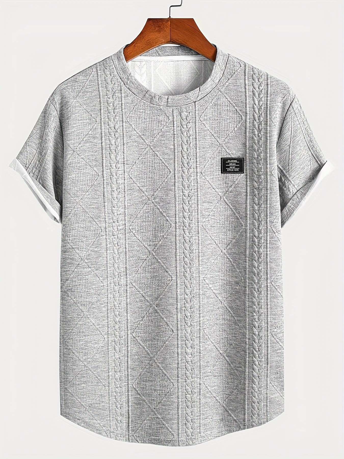 Men's short sleeve t-shirt with embossed pattern, made of 100% polyester knit fabric with slight stretch, crew neck, regular fit.