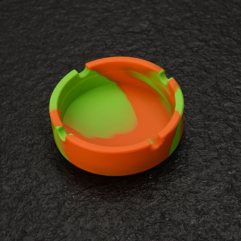 Round silicone ashtray for home or office use, suitable as a gift.