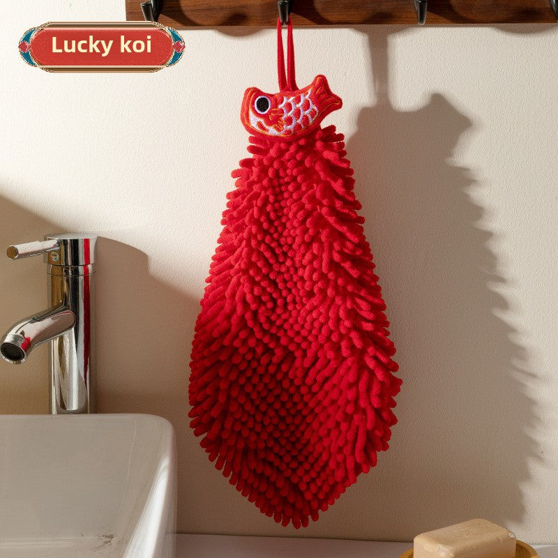 Red chenille hand towel for kitchen and bathroom décor with festive hanging design.