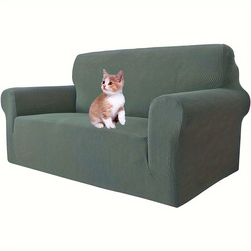 Jacquard fitted sofa slipcover with elastic band, machine washable polar fleece fabric. Compatible with various sofa sizes. Protects furniture from dust and cat scratches.