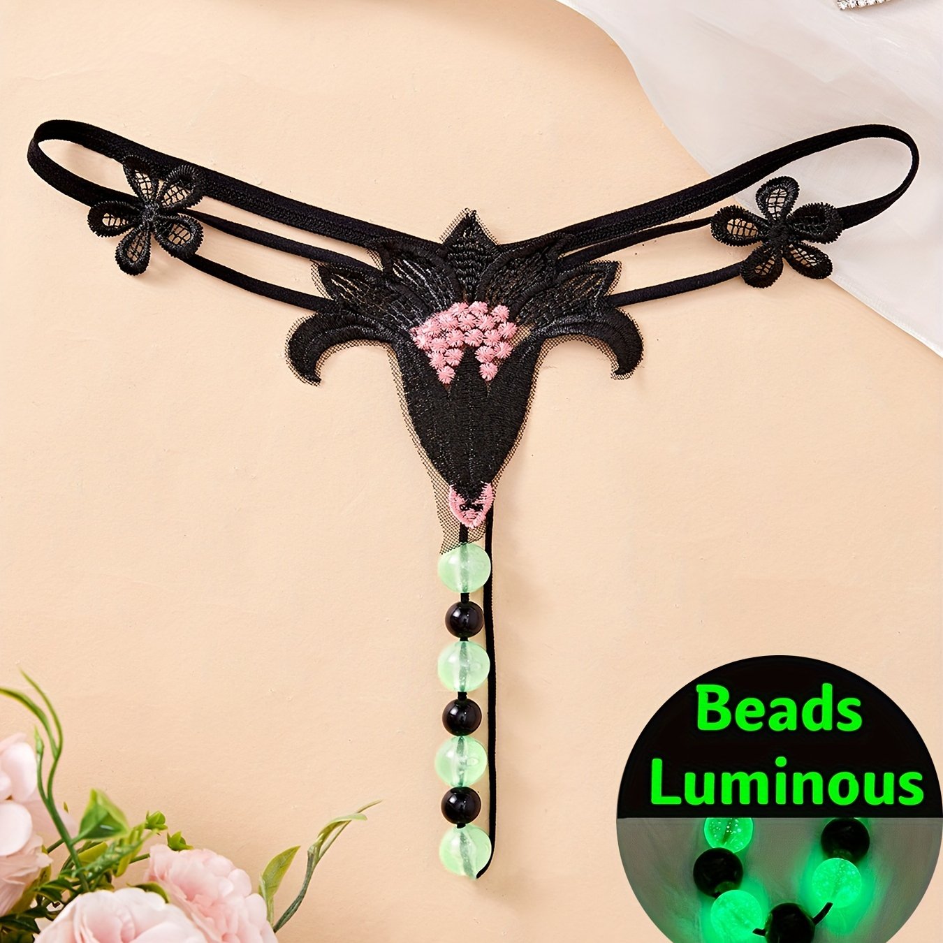 Large luminous beaded massage thong for women - perfect for nights out.