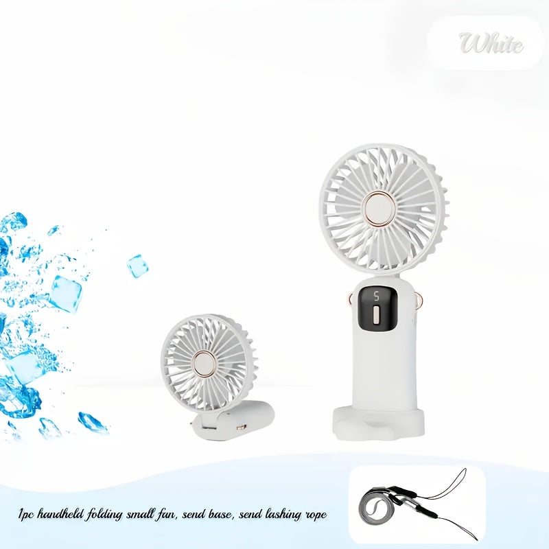 Sleek and stylish white and rose gold Compact & Portable USB Rechargeable Mini Fan with Neck Strap. Perfect for use in the office, classroom, or while traveling. Features a 1200mAh Lithium Battery, desk stand, and includes a power cable for convenient