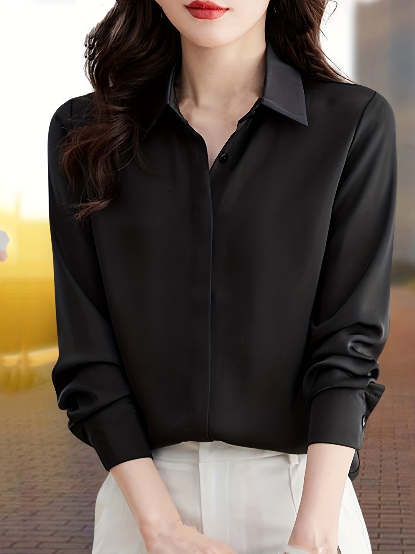 Elegant black long sleeve shirt for women, perfect for all seasons made of non-stretch polyester fabric.