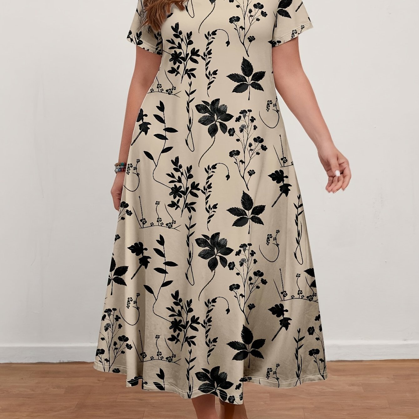 Plus size floral V-neck maxi dress for women in black and white pattern, made of lightweight polyester, perfect for spring and autumn.