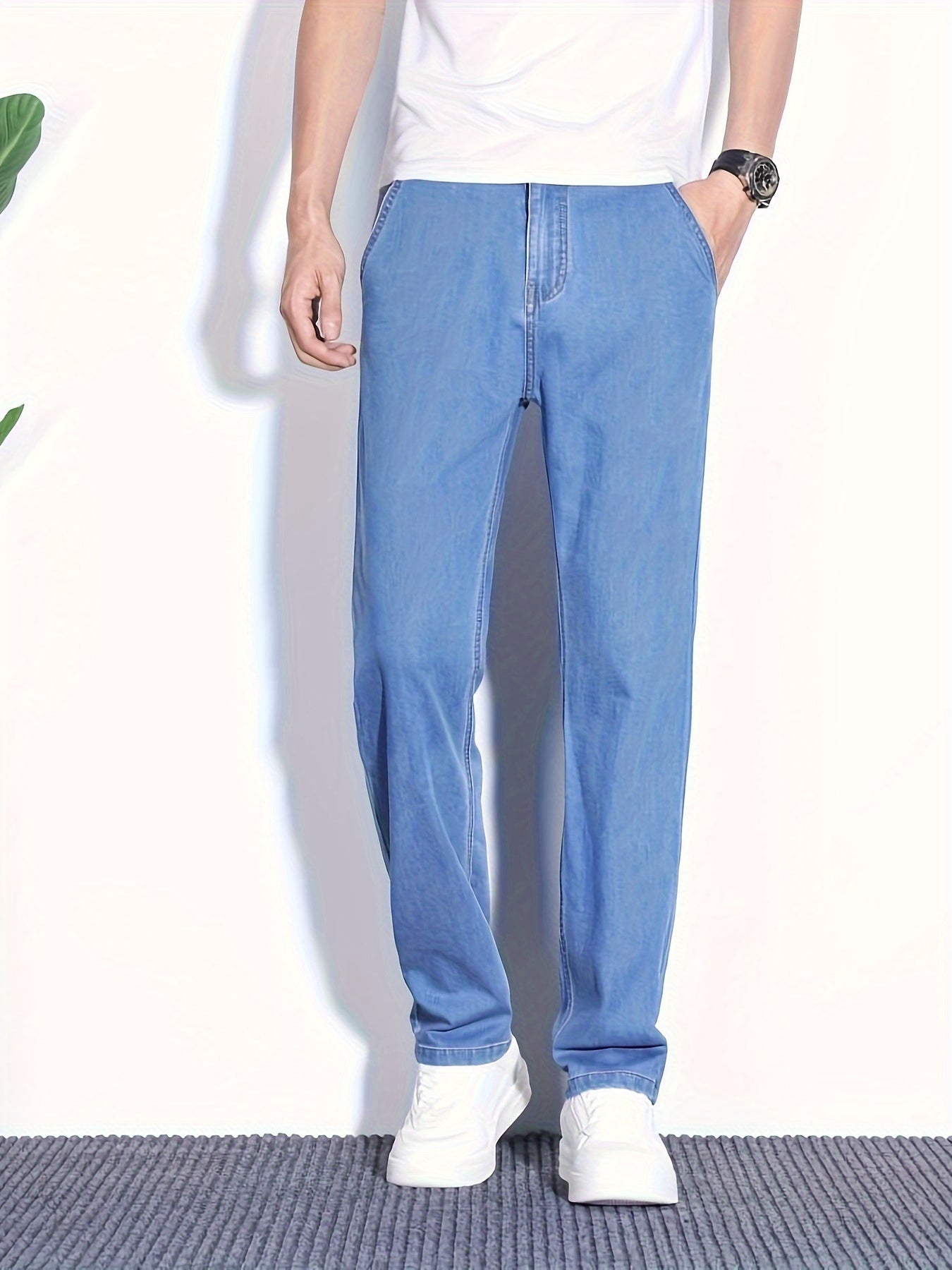 Summer jeans for men, regular fit with breathable lightweight denim and pockets.