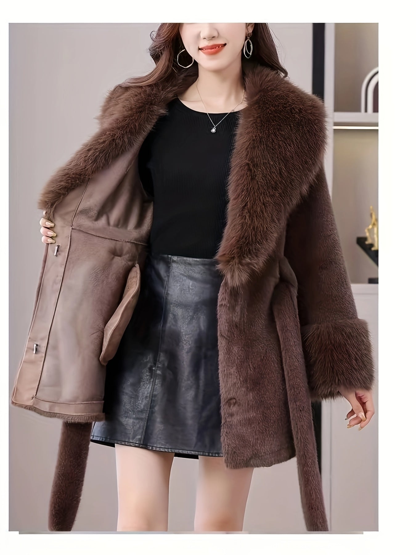 Stylish women's faux fur hooded coat with belt, long sleeves, and mid-length.