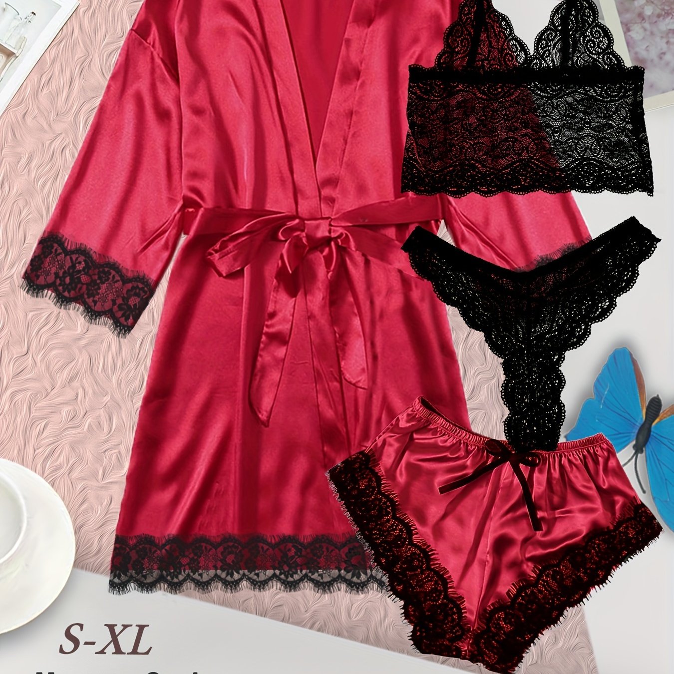 Women's loungewear set with lace detailing, robe, V neck cami, panties, and shorts.