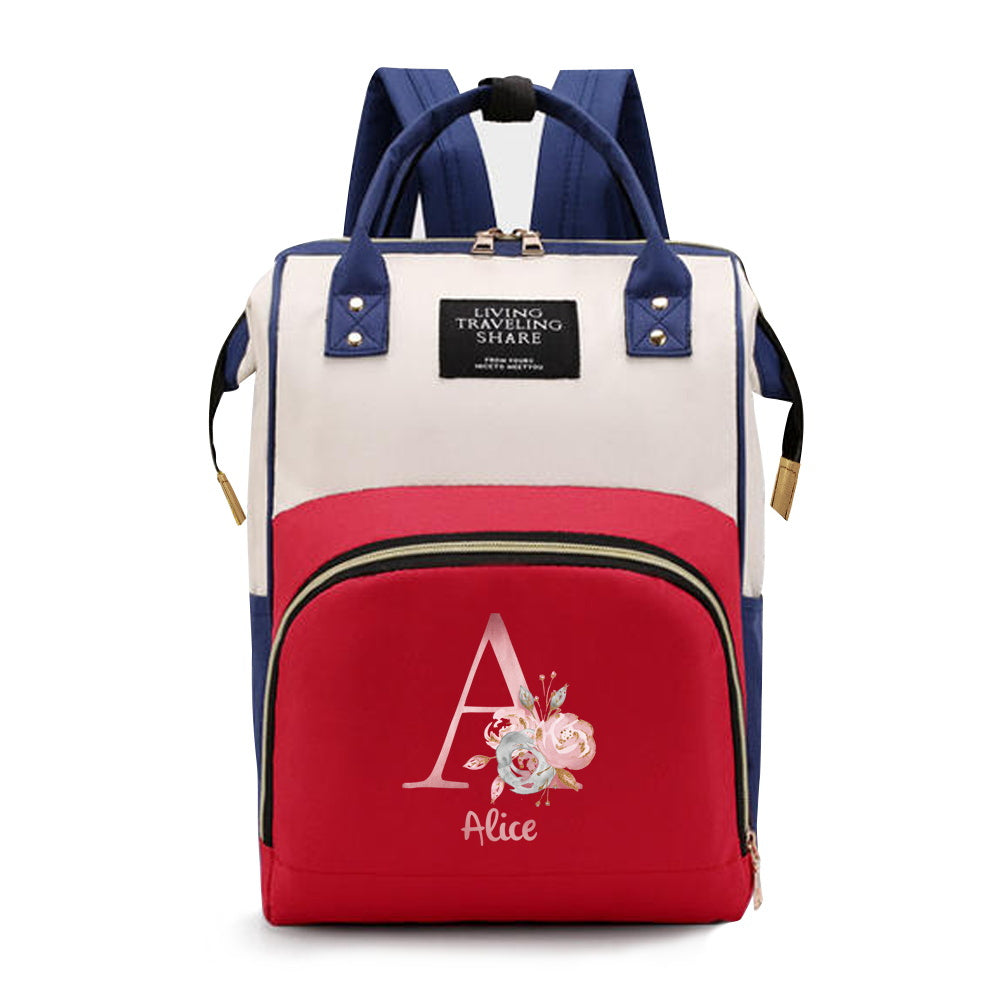 Personalized Mommy Backpack made of durable Oxford cloth with ample storage space for diapers and other essentials. Features customizable initials and name, as well as convenient bottle pockets. Perfect for nursing mothers on-the-go, with options for A-Z