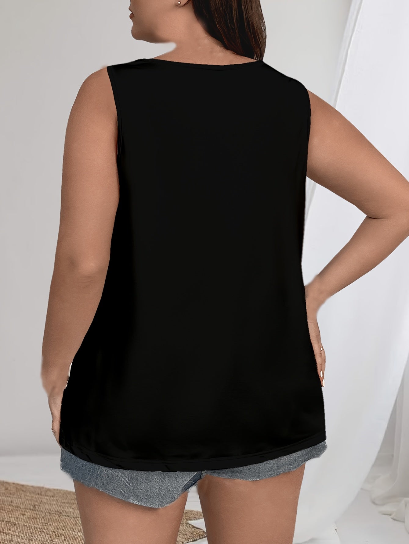 Stylish sleeveless tank top for plus-size Black women with Bohemian ethnic print.