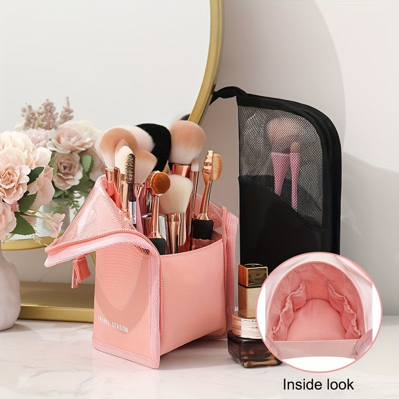 Waterproof wash bag with travel-friendly makeup brush storage, compartmentalized cosmetic storage, and a clear, transparent design.