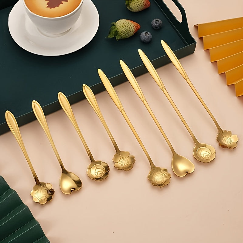 Four stainless steel cherry blossom coffee/dessert spoons.