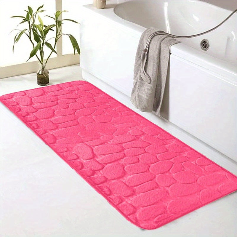 SoftTouch Cobblestone Pattern Memory Foam Bath Mat is machine washable and non-slip, making it a perfect addition to any bathroom. The absorbent polyester material resists stains, making it ideal for use in the bathtub or kitchen. This home decor runner