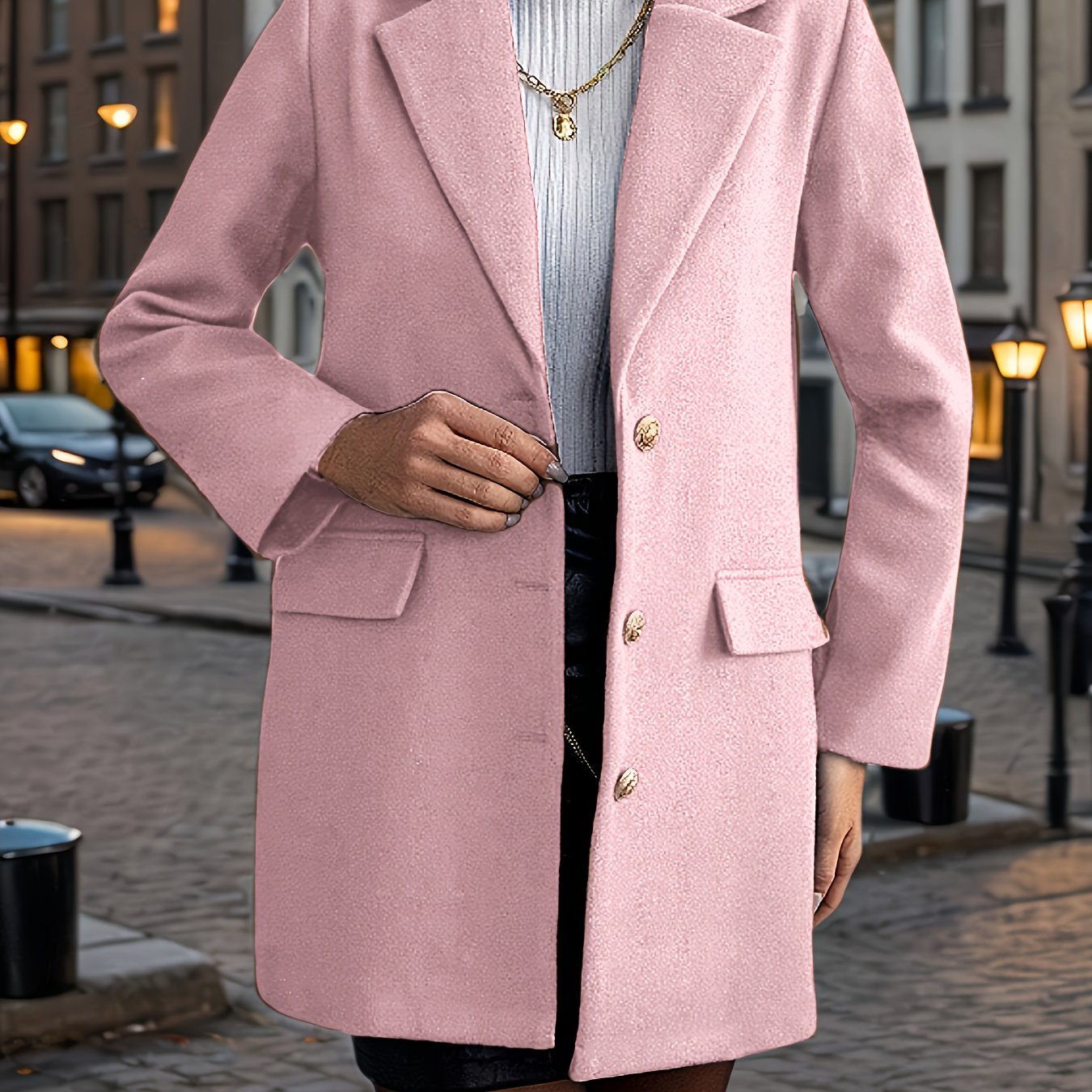 A stylish women's coat with a notched lapel, long sleeves, single-breasted closure, and fake pockets, made of polyester woven fabric for fall/winter outerwear.