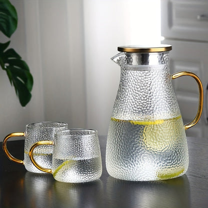 Durable and Elegant Glass Pitcher with Golden Handle - Perfect for Serving Cold Beverages, Tea & Water - Large Capacity, Heat-Resistant Carafe - Dishwasher Safe, Ideal for Home & Restaurant Use