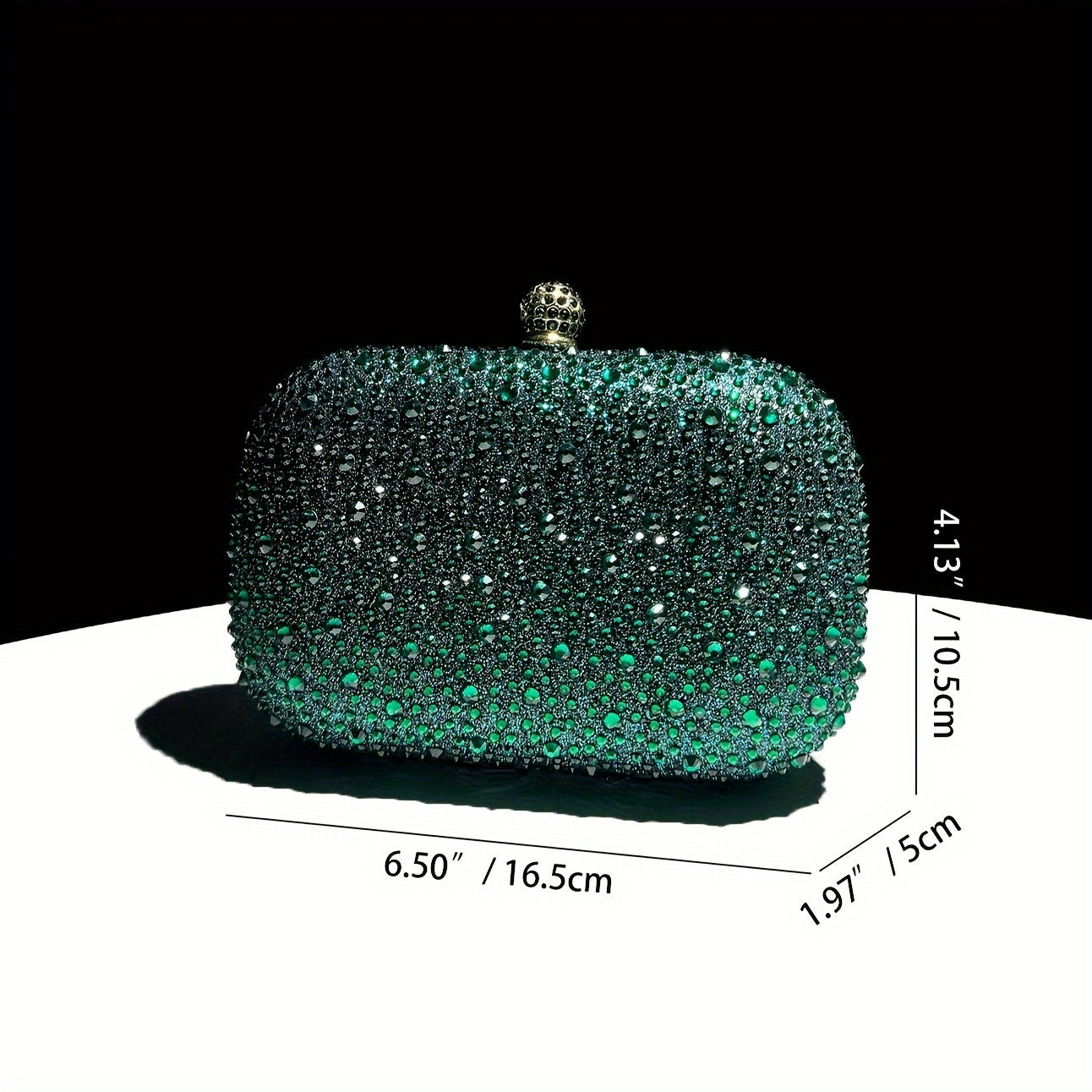 Stylish emerald green handbag with golden chain, suitable for formal events and as a gift for women.