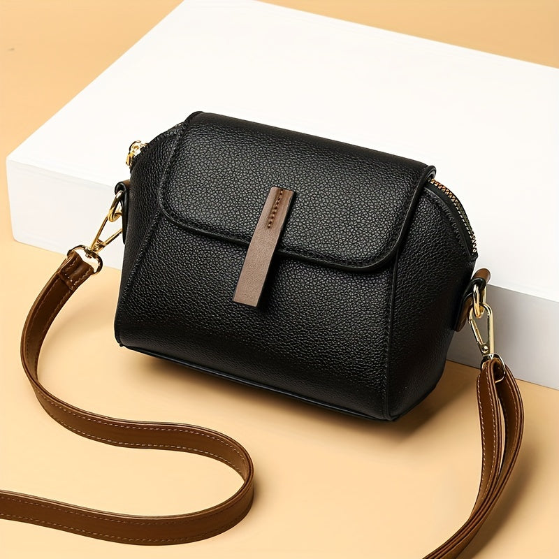 Stylish women's crossbody bag made of PU leather for daily use, measuring 7.1 x 5.1 x 3.5 inches.