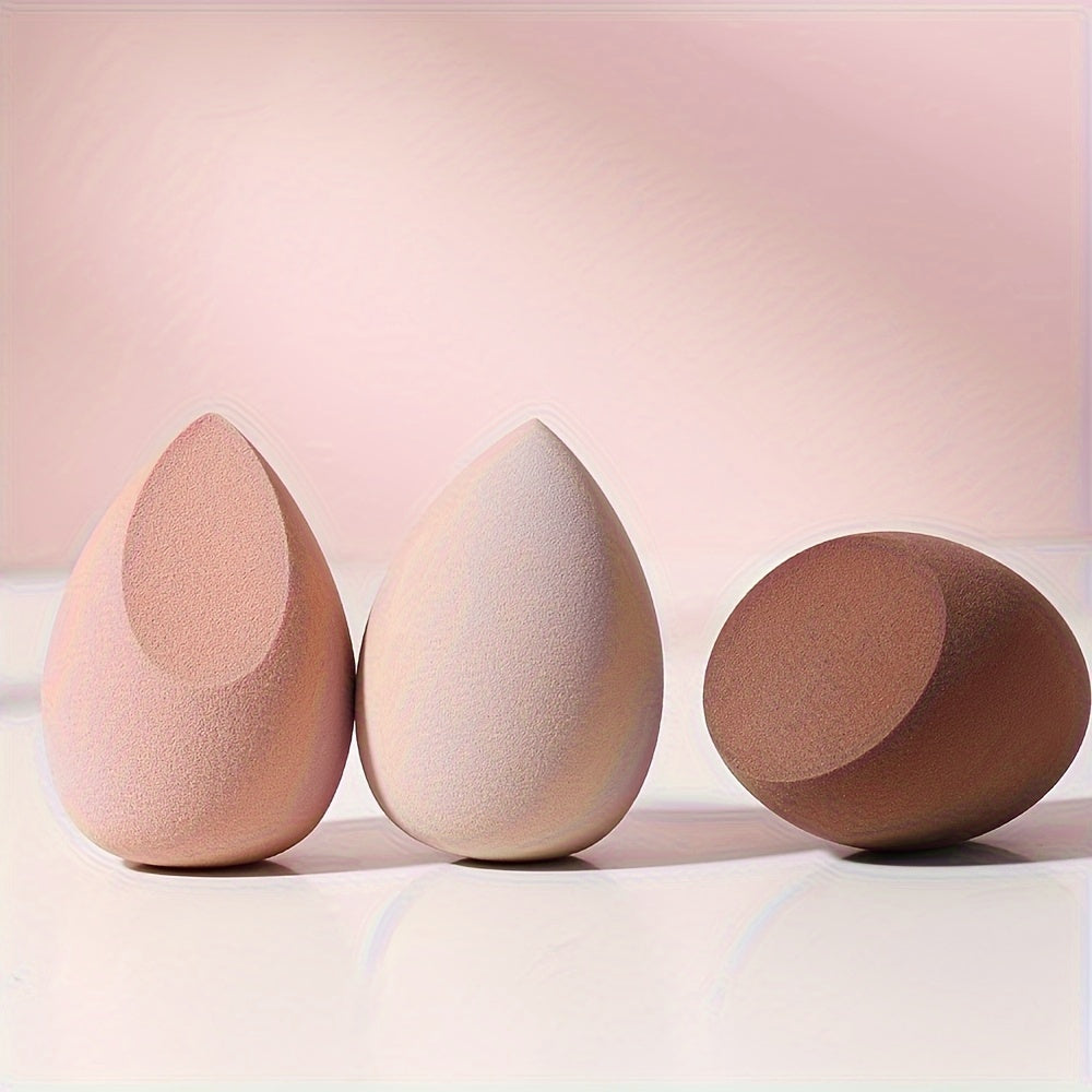 Set of 3 makeup sponges for dry and wet use, expanding egg-shaped cosmetic sponges for foundation and concealer application.