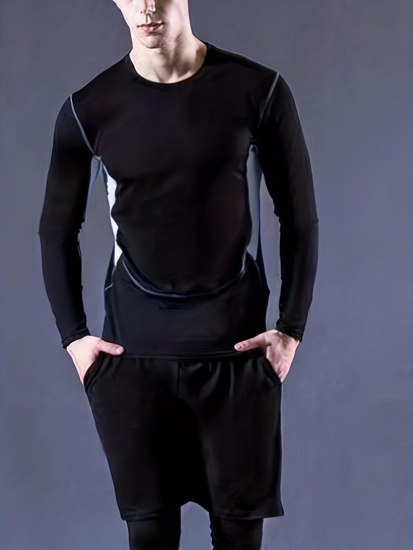 Men's tight sportswear set for gym workouts and running, featuring breathable long sleeve shirts and indoor workout pants.