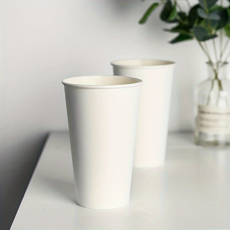 Disposable paper cups in packs of 50, 100, 200, or 500. Each cup has a 200ml capacity and is versatile for both hot and cold beverages. The uncoated white cups are perfect for parties, cafes, and business use. Please hand wash only. - YiYan1